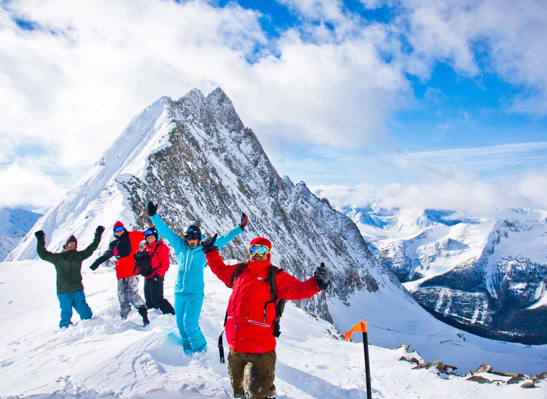 skiers-snowboarders-summit-top